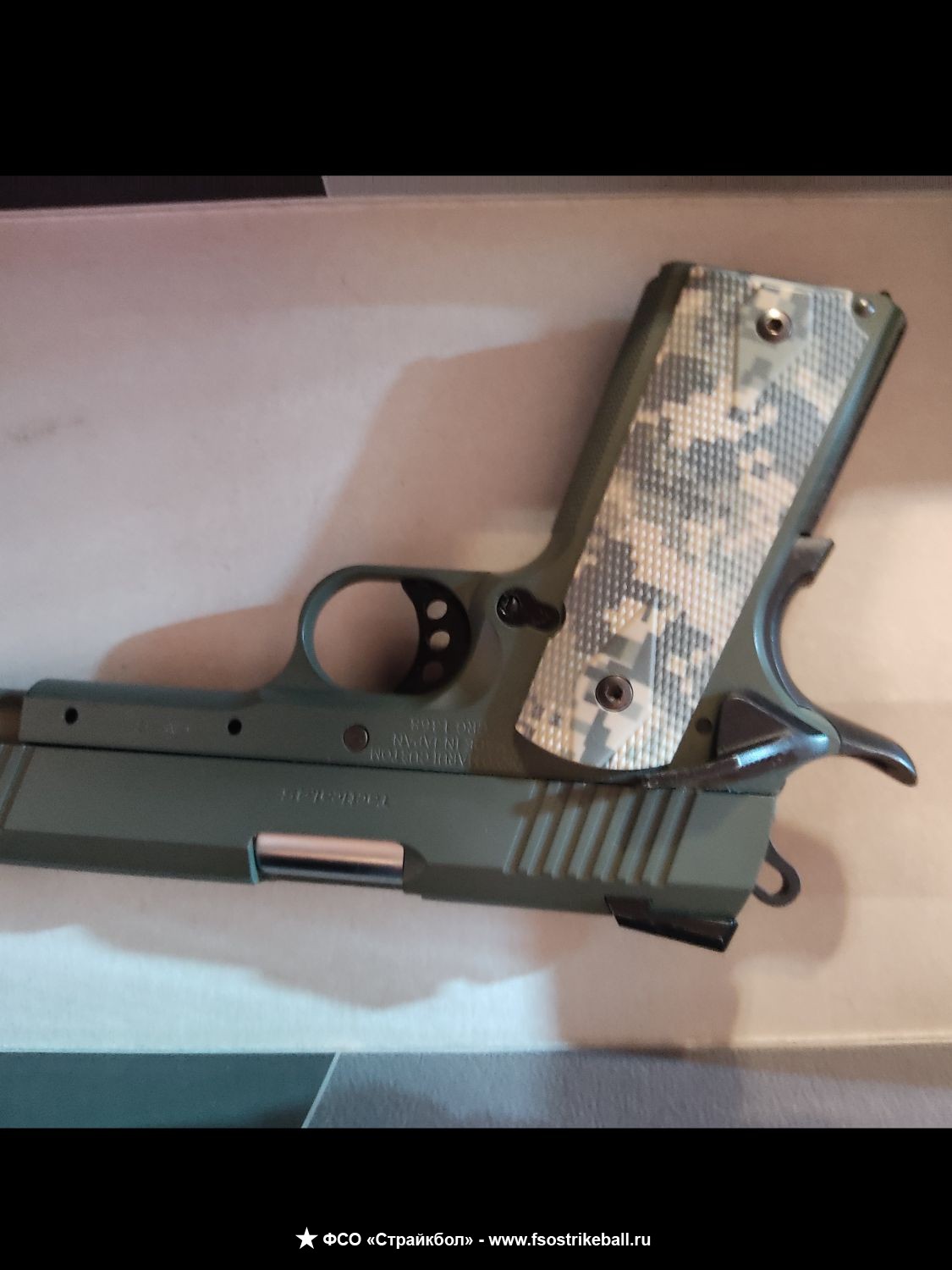 Страйкбольный пистолет